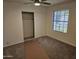 Bedroom with carpet flooring and ceiling fan at 620 S Laveen Dr, Chandler, AZ 85226