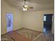 Bright bedroom with carpeted floors and ensuite bathroom access at 620 S Laveen Dr, Chandler, AZ 85226