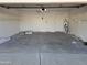 Spacious garage with pegboard and overhead storage at 620 S Laveen Dr, Chandler, AZ 85226