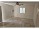 Living room with tile flooring and ceiling fan at 620 S Laveen Dr, Chandler, AZ 85226