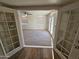 View from the entryway to the living room with carpeted floor at 620 S Laveen Dr, Chandler, AZ 85226