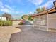 View of backyard with gravel and a portion of the home at 6554 E Dallas St, Mesa, AZ 85205