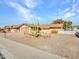 Front yard with gravel and cacti at 6554 E Dallas St, Mesa, AZ 85205