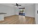 Living room with patio doors and ceiling fan at 6554 E Dallas St, Mesa, AZ 85205