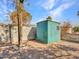 Green metal storage shed in the backyard at 6554 E Dallas St, Mesa, AZ 85205