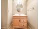 Small bathroom with single vanity and oval mirror at 6710 E University Dr # 147, Mesa, AZ 85205