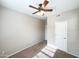 Bedroom with ceiling fan, closet, and neutral walls at 6710 E University Dr # 147, Mesa, AZ 85205