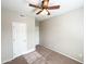 Bright bedroom with ceiling fan and double closets at 6710 E University Dr # 147, Mesa, AZ 85205