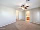 Spacious bedroom with ceiling fan and en-suite bathroom access at 6710 E University Dr # 147, Mesa, AZ 85205