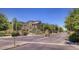 Exterior view of townhouses with gated entrance at 6710 E University Dr # 147, Mesa, AZ 85205