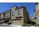 Exterior view of the townhome building, showcasing architectural details and landscaping at 6710 E University Dr # 147, Mesa, AZ 85205