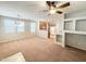 Open living space with kitchen views and built-in shelving at 6710 E University Dr # 147, Mesa, AZ 85205