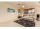 Living room with large window and comfy seating at 7304 E Northridge Cir, Mesa, AZ 85207