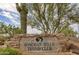 Stone sign marking entrance to Sonoran Hills Tennis Club at 7304 E Northridge Cir, Mesa, AZ 85207