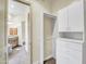 View of bathroom with vanity and access to a walk-in closet at 8494 E Gilded Perch Dr, Scottsdale, AZ 85255