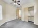 Bright bedroom with ceiling fan, closet, and neutral decor at 8494 E Gilded Perch Dr, Scottsdale, AZ 85255