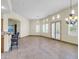 Spacious dining area with tile floors and access to the kitchen at 8494 E Gilded Perch Dr, Scottsdale, AZ 85255