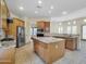 Modern kitchen featuring granite counters, stainless steel appliances, and an island at 8494 E Gilded Perch Dr, Scottsdale, AZ 85255