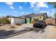 Modern home exterior with a spacious driveway at 8608 E Palo Verde Dr, Scottsdale, AZ 85250