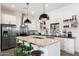 Spacious kitchen featuring stainless steel appliances and granite countertops at 8608 E Palo Verde Dr, Scottsdale, AZ 85250