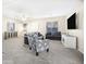 Spacious living room featuring neutral colors and comfortable furniture at 8709 W Hammond Ln, Tolleson, AZ 85353