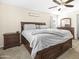 Main bedroom with a king-size bed and lots of natural light at 8709 W Hammond Ln, Tolleson, AZ 85353