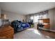 Bedroom with desk, built in dresser and queen bed at 9215 W Raintree Dr, Sun City, AZ 85351