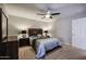 Well-lit bedroom featuring a ceiling fan and double bed at 9215 W Raintree Dr, Sun City, AZ 85351