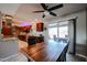 Bright dining room with wood table and access to the backyard patio at 9215 W Raintree Dr, Sun City, AZ 85351