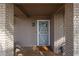 Inviting front entry with a decorative security door and brick accents at 9215 W Raintree Dr, Sun City, AZ 85351