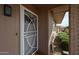 Inviting front entrance with a security door and landscaping at 9215 W Raintree Dr, Sun City, AZ 85351