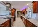 Renovated kitchen featuring granite countertops and stainless steel appliances at 9215 W Raintree Dr, Sun City, AZ 85351