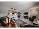 Bright and airy living room with comfortable seating and large windows at 9215 W Raintree Dr, Sun City, AZ 85351