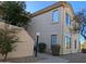 Tan stucco building with Spanish-style architecture and landscaping at 9253 N Firebrick Dr # 212, Fountain Hills, AZ 85268