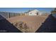 Large backyard with gravel and block wall at 9321 W Hillcrest Pl, Arizona City, AZ 85123