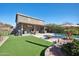 Large backyard oasis with a sparkling pool and patio at 109 E Milada Dr, Phoenix, AZ 85042