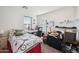 Bright bedroom featuring a full-size bed and a desk area at 109 E Milada Dr, Phoenix, AZ 85042