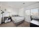 Cozy bedroom with a queen-size bed and small workspace at 109 E Milada Dr, Phoenix, AZ 85042