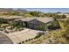 Single-story home with mountain views, well-manicured landscaping and driveway at 11175 N 121St Way, Scottsdale, AZ 85259