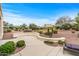 Expansive backyard featuring desert landscaping, a charming patio area, and tranquil garden views at 12942 W Sola Dr, Sun City West, AZ 85375