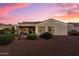 Spacious backyard with manicured landscaping and mature trees at 12942 W Sola Dr, Sun City West, AZ 85375