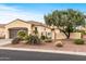 Lovely home featuring a tile roof, desert landscaping, and inviting curb appeal at 12942 W Sola Dr, Sun City West, AZ 85375