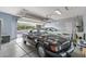 Spacious garage with two cars, including a black classic and a modern white sedan at 12942 W Sola Dr, Sun City West, AZ 85375