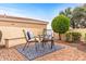 Inviting outdoor seating area featuring a stylish rug and comfortable chairs at 12942 W Sola Dr, Sun City West, AZ 85375