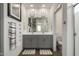 Clean bathroom with double vanity and separate toilet at 14627 W Valentine St, Surprise, AZ 85379