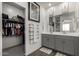 Bathroom with double vanity and walk-in closet at 14627 W Valentine St, Surprise, AZ 85379