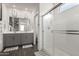 Modern bathroom with double vanity and large shower at 14627 W Valentine St, Surprise, AZ 85379