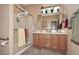 Bathroom with double vanity, shower, and ample storage at 1780 W Morse Dr, Anthem, AZ 85086