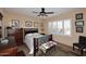 Bedroom with wood furniture, and window with shutters at 1780 W Morse Dr, Anthem, AZ 85086