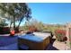 Hot tub on a brick patio with mountain view at 1780 W Morse Dr, Anthem, AZ 85086